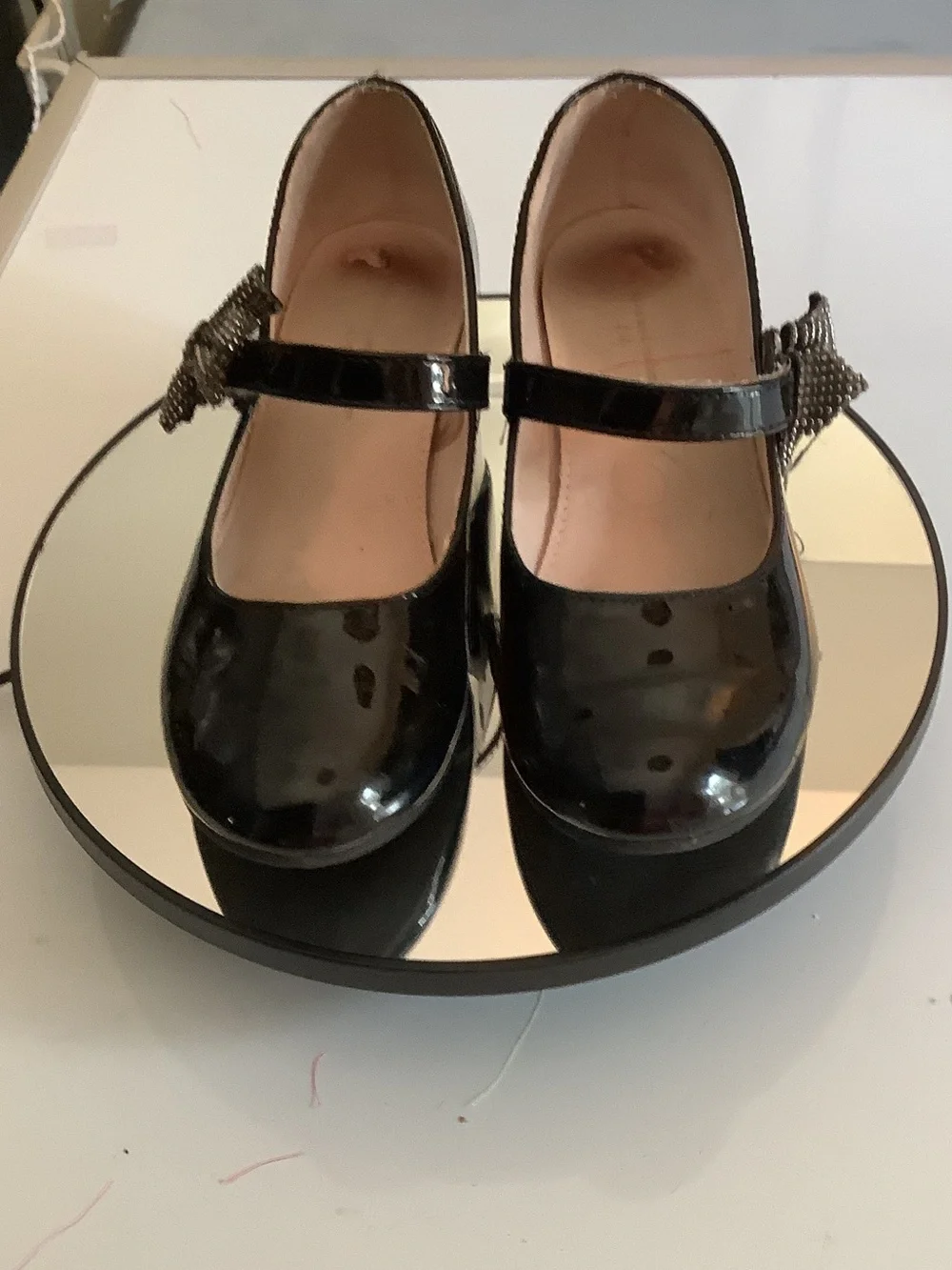 cupcakes & cashmere Black Patent Mary Jane Wedges with Embellished Bow